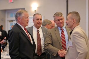 LtGen Bob Shea, USMC (Ret)  (Left) discusses presentations with IT Day attendees